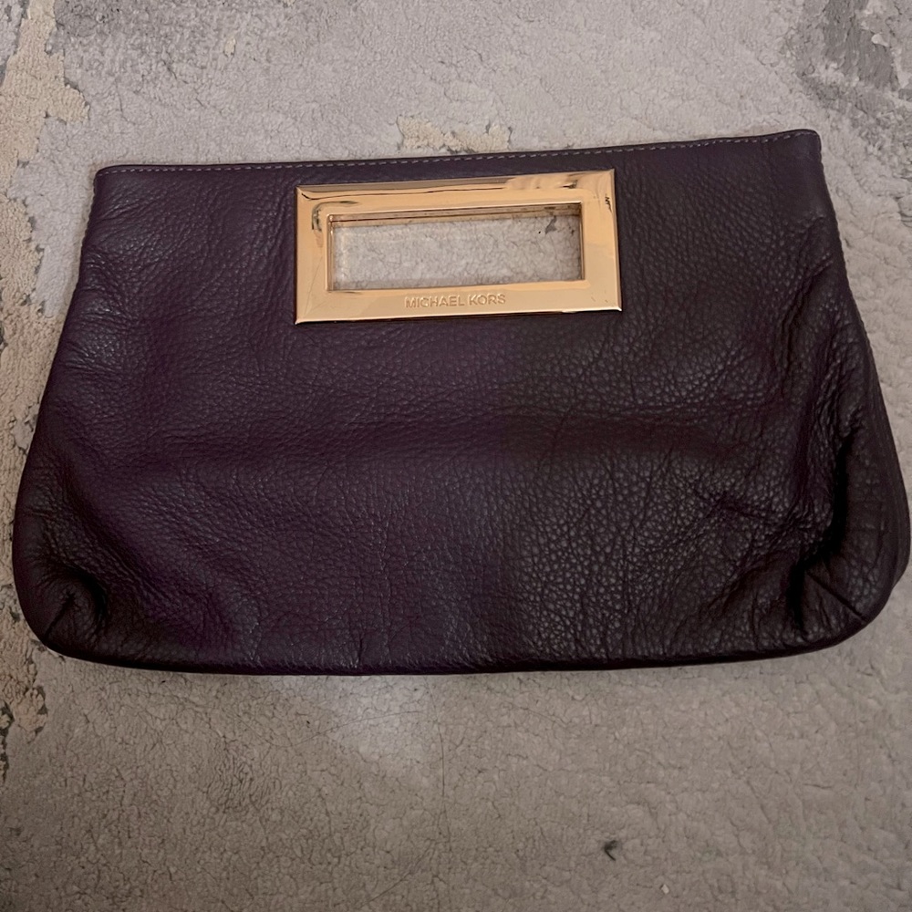 Michael Kors purple and gold clutch great condition leather